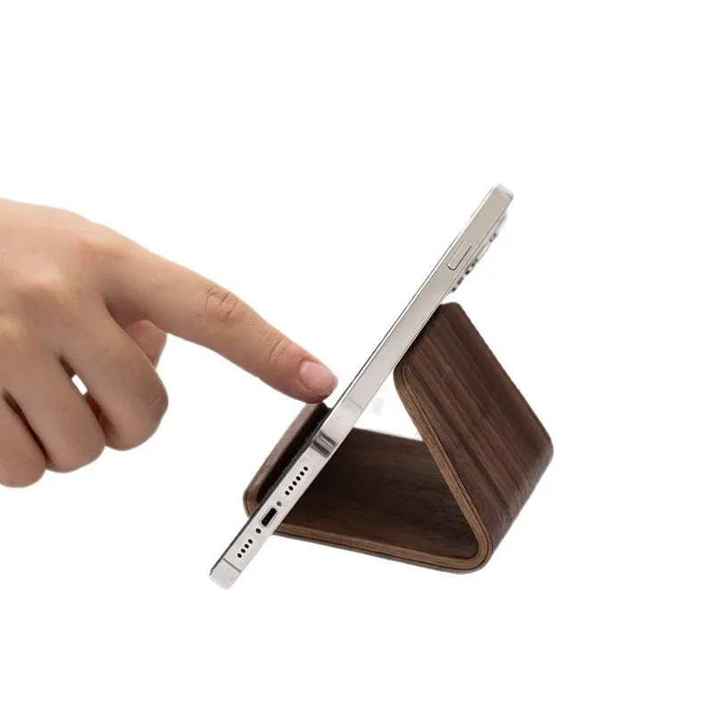 Nolan Curved Phone Stand: in context; styling objects not included